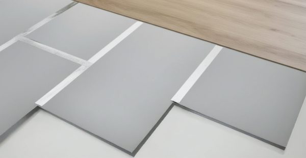 Moderne Bodenfliesen in grauer Optik für hochwertige Raumgestaltung, Malerbetrieb Maier-Quantius